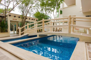 Гостиница Condo Casa del Arbol  Плая-Дель-Кармен
